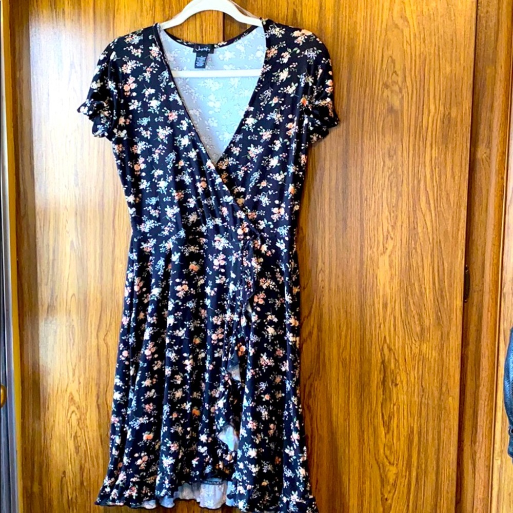 Flower print dress. Accentuates bust line.